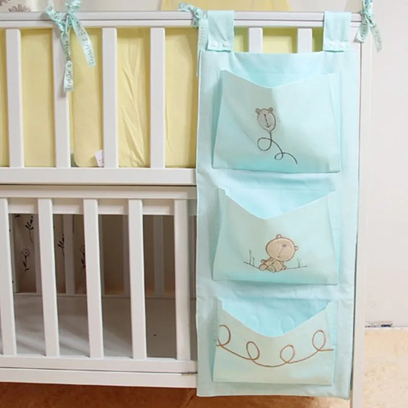 "Organize and Simplify: Baby Bed Hanging Storage Bag for Crib Bedding Set - Perfect for Toys, Diapers, and More!"