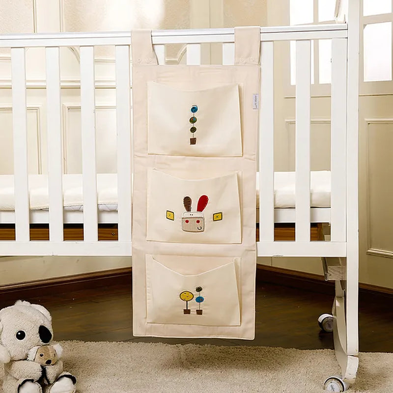 "Organize and Simplify: Baby Bed Hanging Storage Bag for Crib Bedding Set - Perfect for Toys, Diapers, and More!"