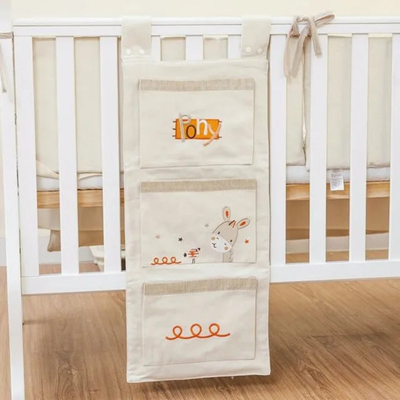 "Organize and Simplify: Baby Bed Hanging Storage Bag for Crib Bedding Set - Perfect for Toys, Diapers, and More!"