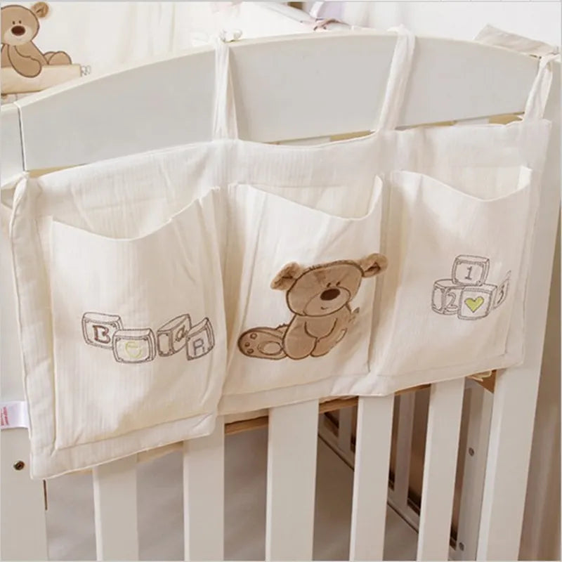 "Organize and Simplify: Baby Bed Hanging Storage Bag for Crib Bedding Set - Perfect for Toys, Diapers, and More!"